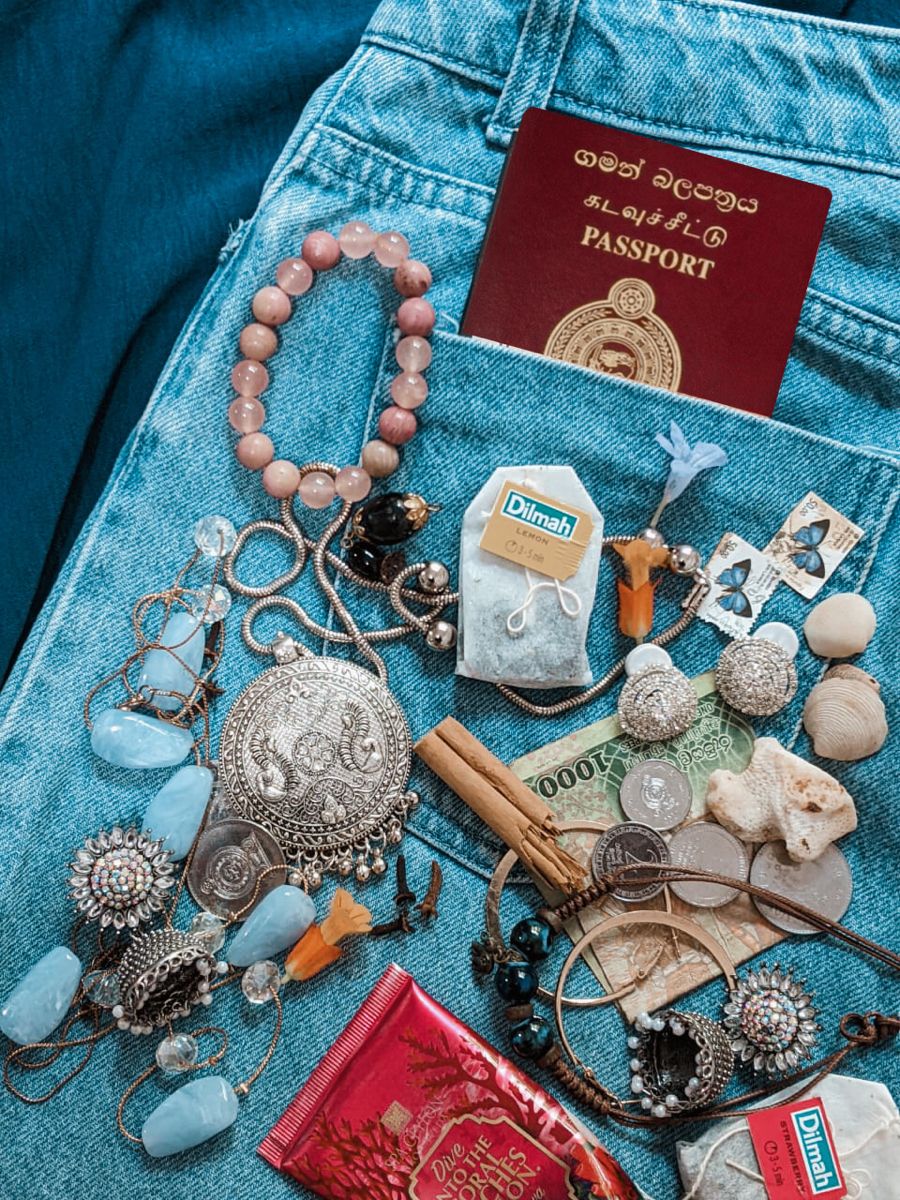 A Sri Lankan passport and colourful travel keepsakes